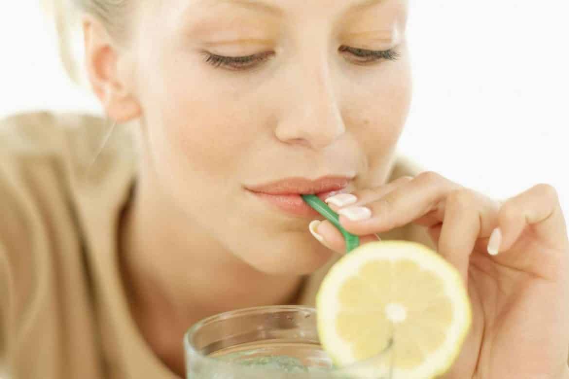 Image result for woman drink lemon water