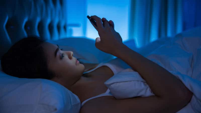 Image result for woman use phone before sleep